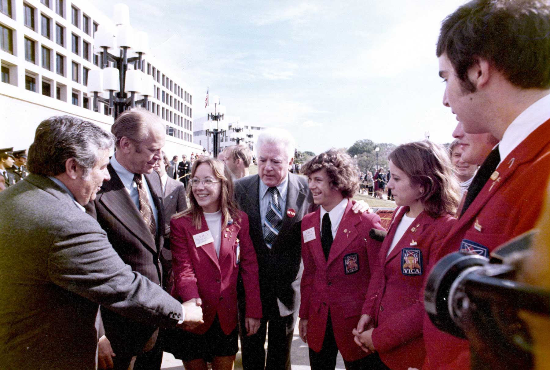 Pres. Gerald Ford with VICA students.}
