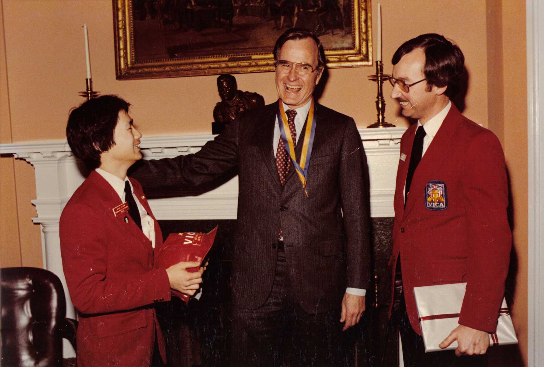 Pres. George Bush and VICA student and advisor.}