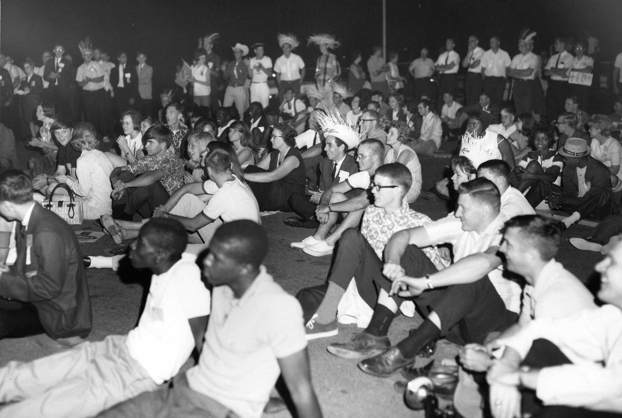 VICA students seated on the floor.}