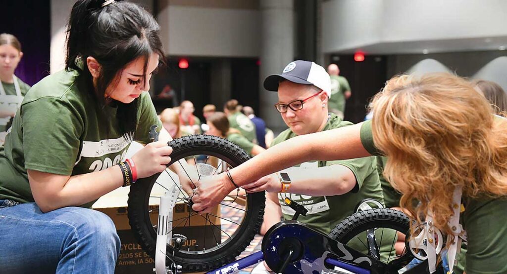 Students building a bike.