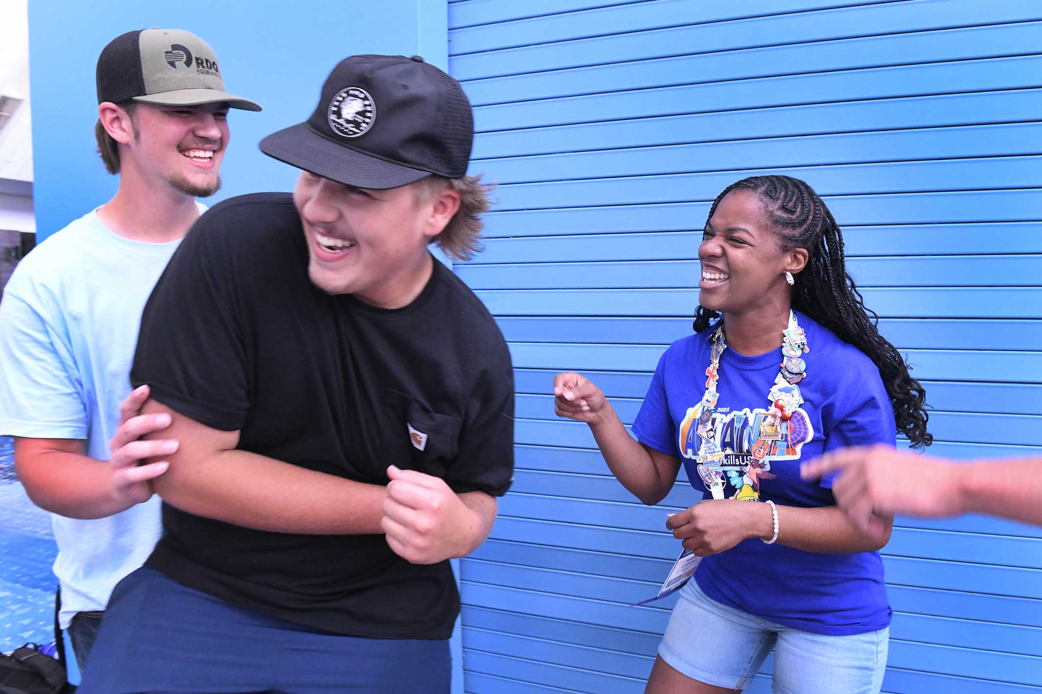 Three smiling students