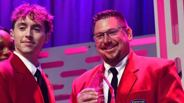 Memphis Hixon and Bryan Raeckelboom on stage at NLSC